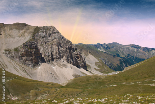 Panoramic view of Pizzo del Diavolo from the summit of monte Vettore at sunset in the Marche region Italy photo