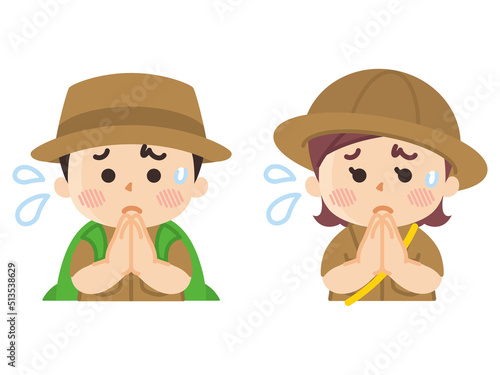 手を合わせて謝る探検隊の子供　ボーイスカウト　冒険　アウトドア