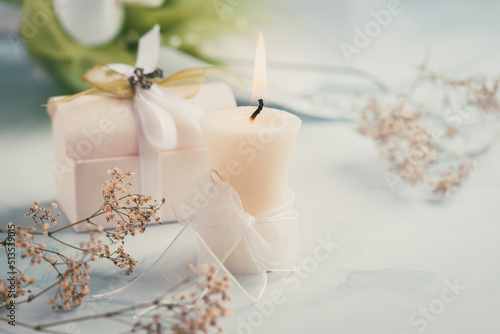 Fotobehang First holy communion or confirmation - candle with flowers and small present
