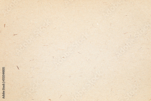 Brown kraft paper texture with scattered details