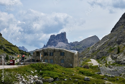 View of Fortre Tre Sassi at Valparola mountain pass and Averau mountain behind in Dolomite mountains in Veneto region and Belluno province in Italy photo