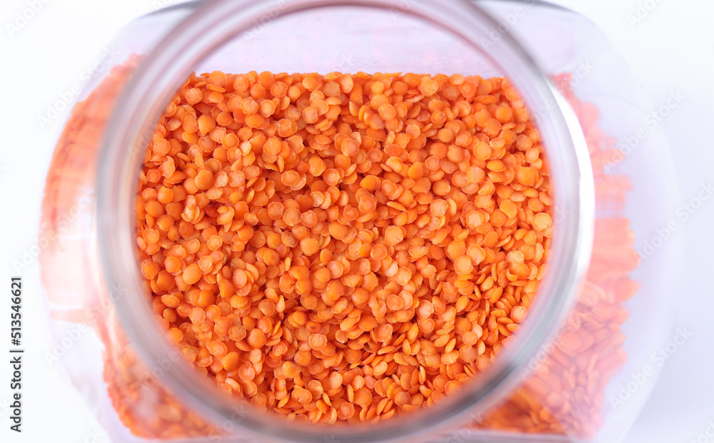 Red lentils in a glass jar. Red lentils in a glass jar.