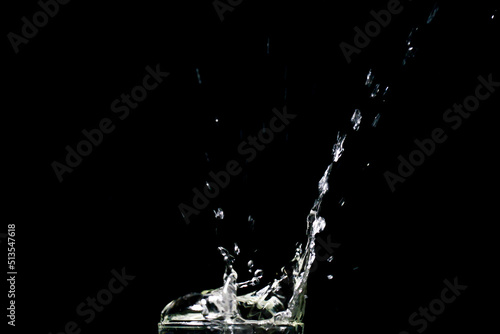 Water splashing on a black background. abstract background of water diffused on black background