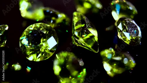 Gemstone chrysolite bright olive color. Exquisite gemstone chrysolite photo