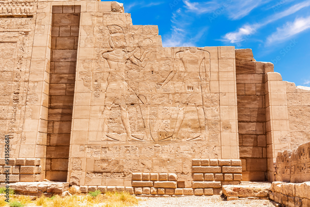 Ancient carvings on the wall of the Karnak Temple, 7 pylon view, Luxor, Egypt