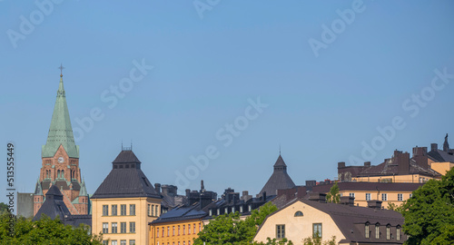 Panorama view with roofs and church tower in the district Södermalm a sunny summer day in Stockholm