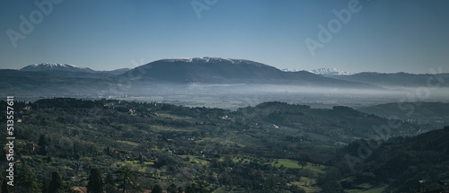 Canvas-taulu Aerial view of the forests on mountains in Umbria, Italy