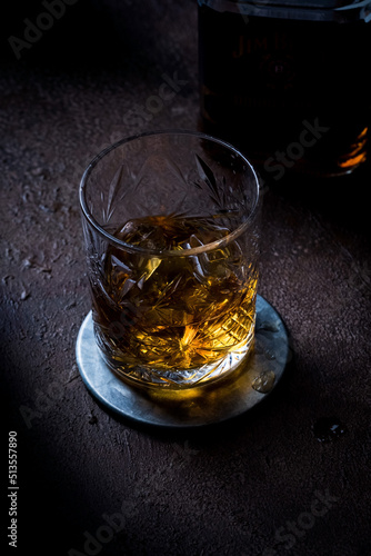 Glass of whiskey on restaurant table