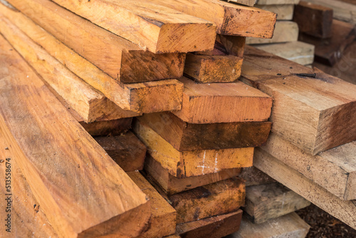 Stacked Mahogany and Gmelina lumber for sale at a local lumber supply in the Philippines. photo