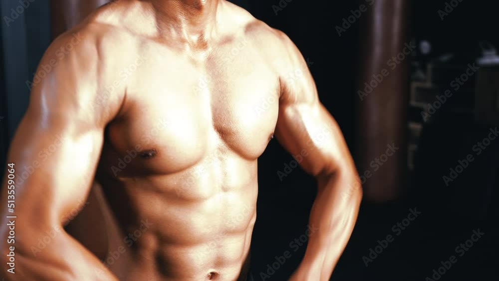 Sportsman exercise workout at gym fitness training sport with kettlebells weight lifting and legs squat healthy lifestyle bodybuilding. Sportsman exercise workout at gym fitness training sport with kettlebells weight lifting and legs squat healthy lifestyle bodybuilding.
