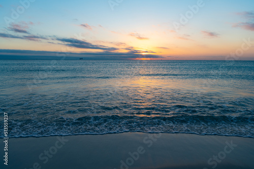 beautiful bermudas sunset with sea water on the summer beach