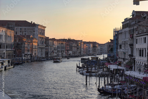 Venice, Italy : Wide angle view of famous Canal Grande. Colorful spring view from Rialto Bridge, Picturesque morning seascape of Adriatic Sea. Traveling concept background