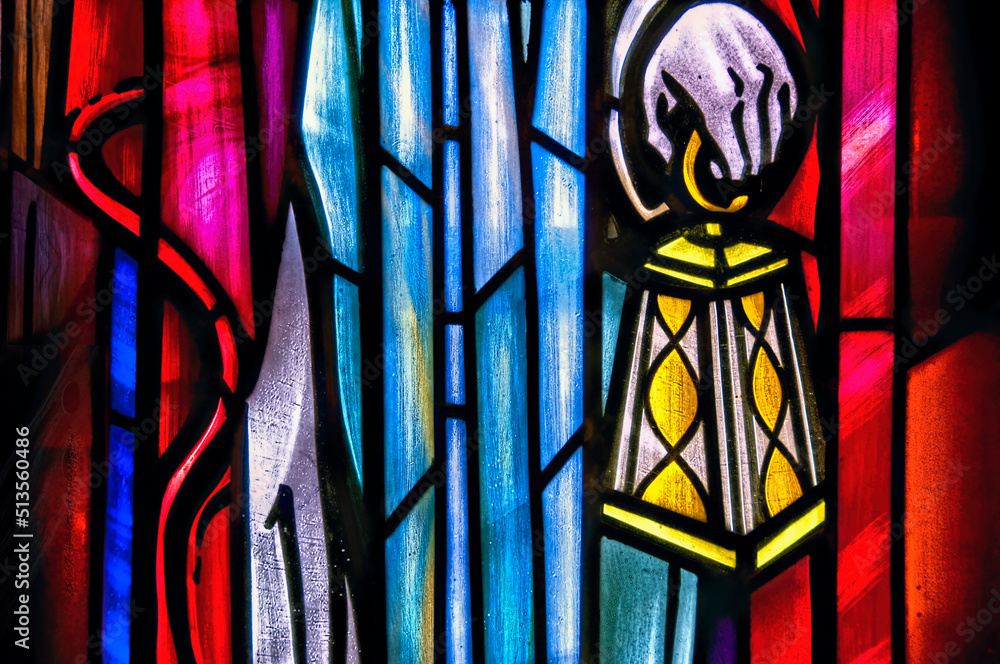 stained glass window, hand holding lantern