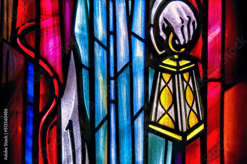 stained glass window  hand holding lantern