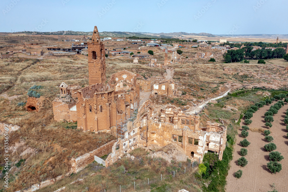 a view of the remains of the old town of Belchite, Spain, destroyed during the Spanish Civil War and abandoned from then, highlighting the San Martin de Tours church