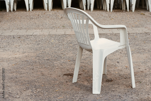 single white garden chair in summer © funkenzauber