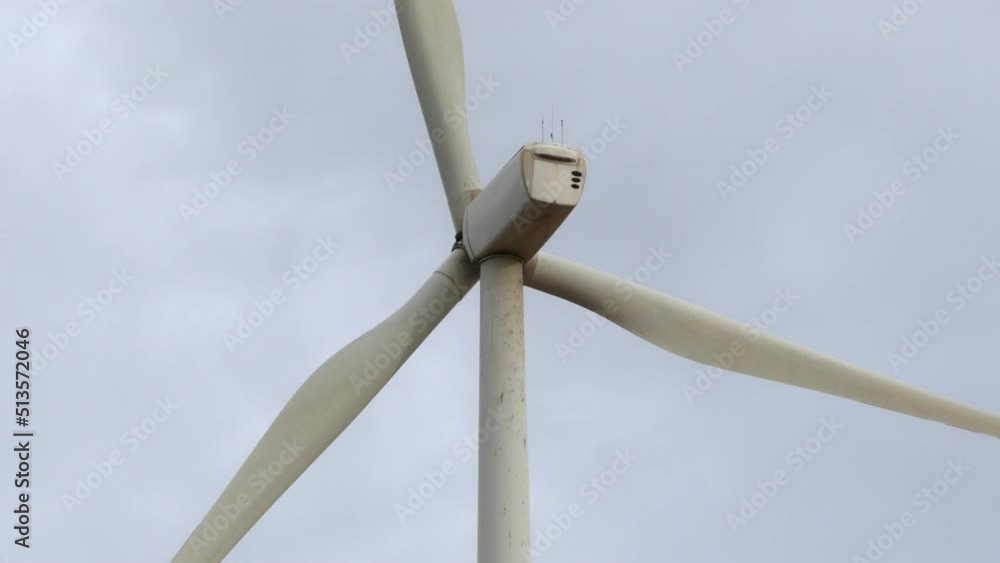 Detail of the blades of a windmill turning. Wind energy, renewable energies Detail of the blades of a windmill turning. Wind energy, renewable energies