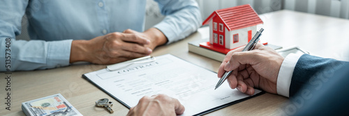Real estate broker agent consulting the customer to a decision making sign insurance form contract, home model mortgage loan offer for and house insurance