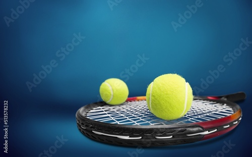 Pickleball Paddle and ball of court background. © BillionPhotos.com