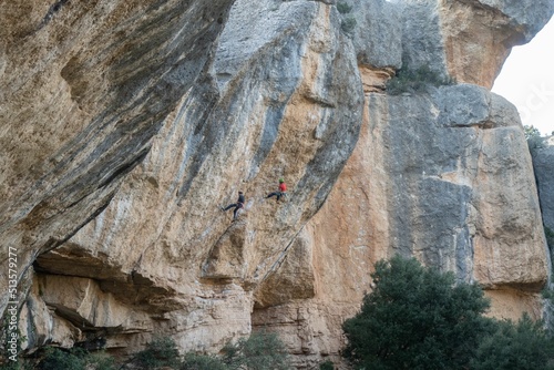 Beautiful view of rocks with trees on a sunny day in Margalef, Spain photo