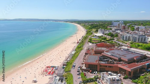 Bournemouth, UK: Aerial view of city in England, wide beach, blue waters of Atlantic Ocean in seaside resort in summer, sunny day with clear blue sky - landscape panorama of United Kingdom from above photo