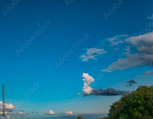 a blue sky with clouds of an original form. sky landscape