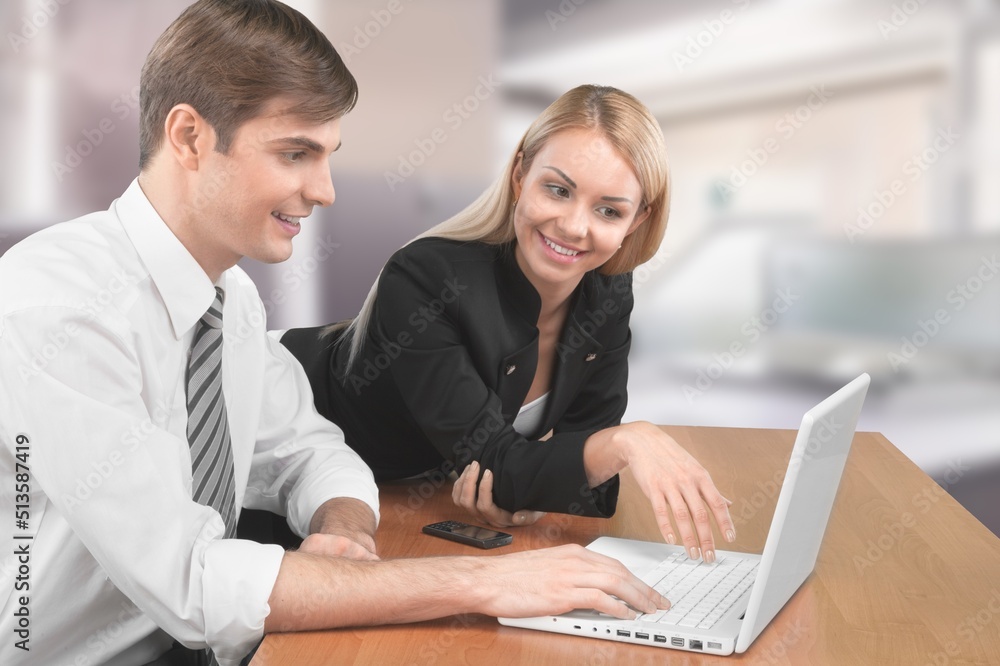 Obraz premium Portrait of success business people working together in home office. Couple teamwork concept