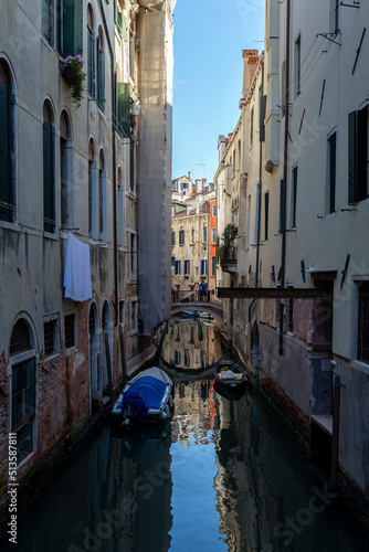 Narrow canal in Venice on a summer morning © skovalsky