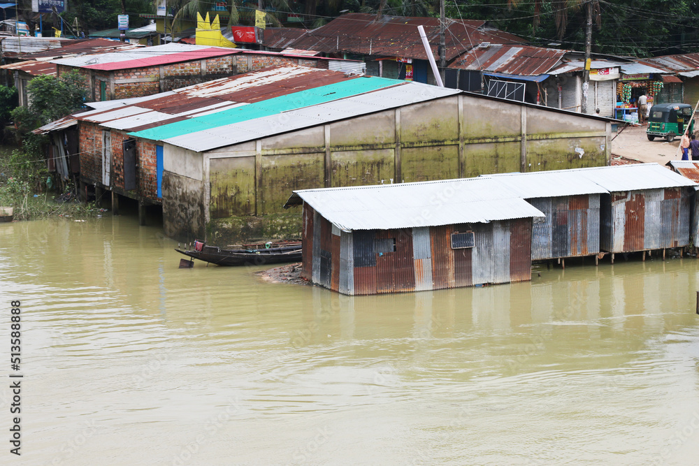 Flooded markets and houses at sylhet, bangladesh due to heavy rainfall. climate change and global warning.
