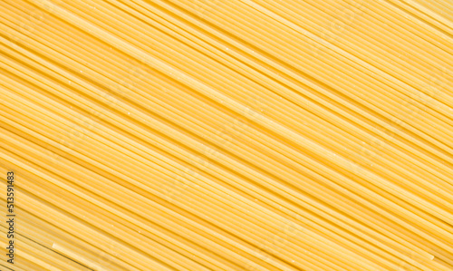 Rectangular geometric pattern of pasta bavette. Background image of pasta from durum wheat.
