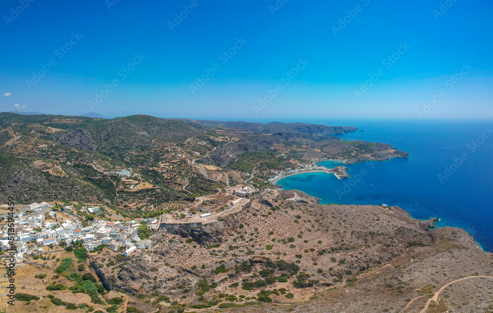Fototapeta premium Breathtaking aerial panoramic view over Chora, Kythera by the Castle at sunset. Majestic scenery over Kythera island in Greece, Europe