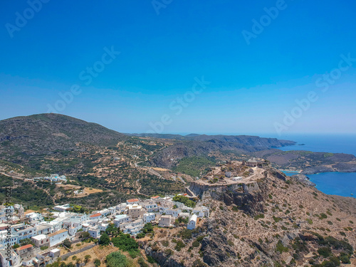 Breathtaking aerial panoramic view over Chora, Kythera by the Castle at sunset. Majestic scenery over Kythera island in Greece, Europe © panosk18