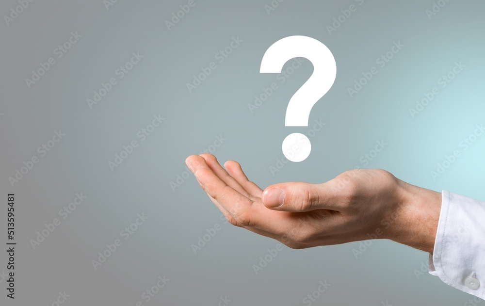 businessman hand holding question mark. concept of Question mark and FAQs, Ask quiestion online businessman hand holding question mark. concept of Question mark and FAQs, Ask quiestion online