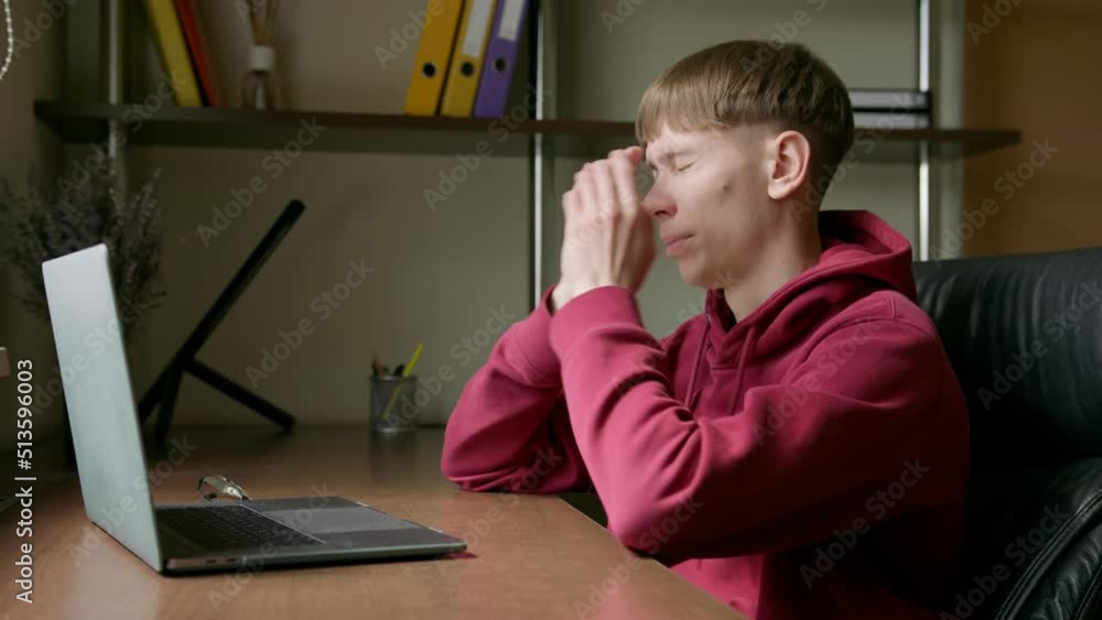 Guy, typing on laptop, takes off eyeglasses, rubbing his eyes and close laptop Guy, typing on laptop, takes off eyeglasses, rubbing his eyes and close laptop