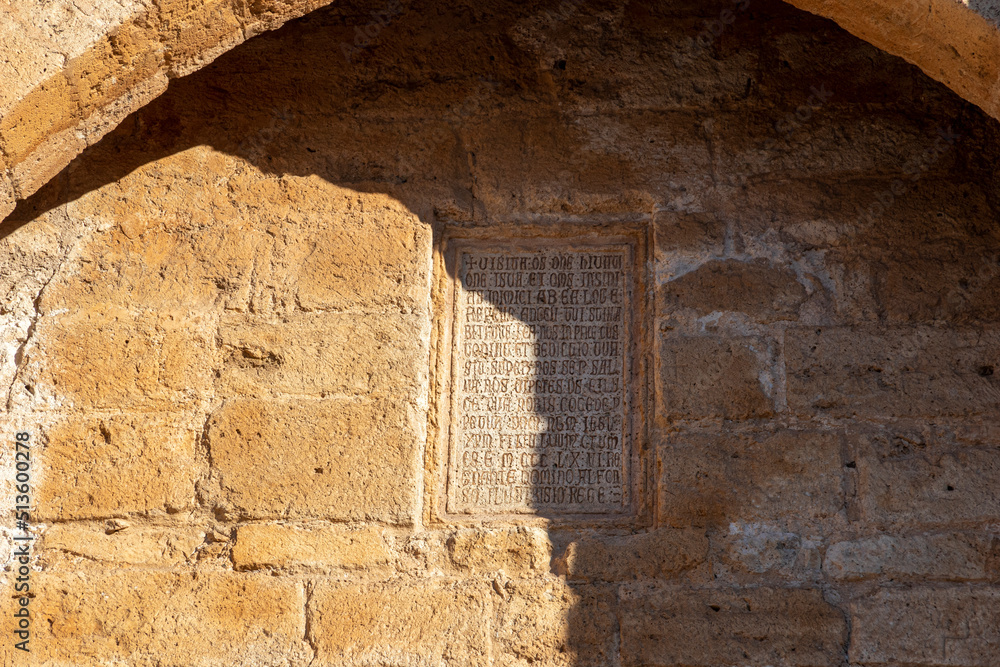 Ciudad Real, Spain. Informative text inscriptions in the Puerta de Toledo (Toledo Gate), a Gothic fortified city entrance formerly part of the walls