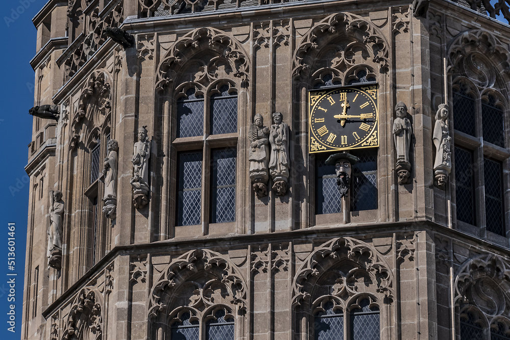 Architectural details of medieval Cologne Town Hall (Rathaus Koln) - XV century Gothic style tower. Cologne, North Rhine Westphalia, Germany.