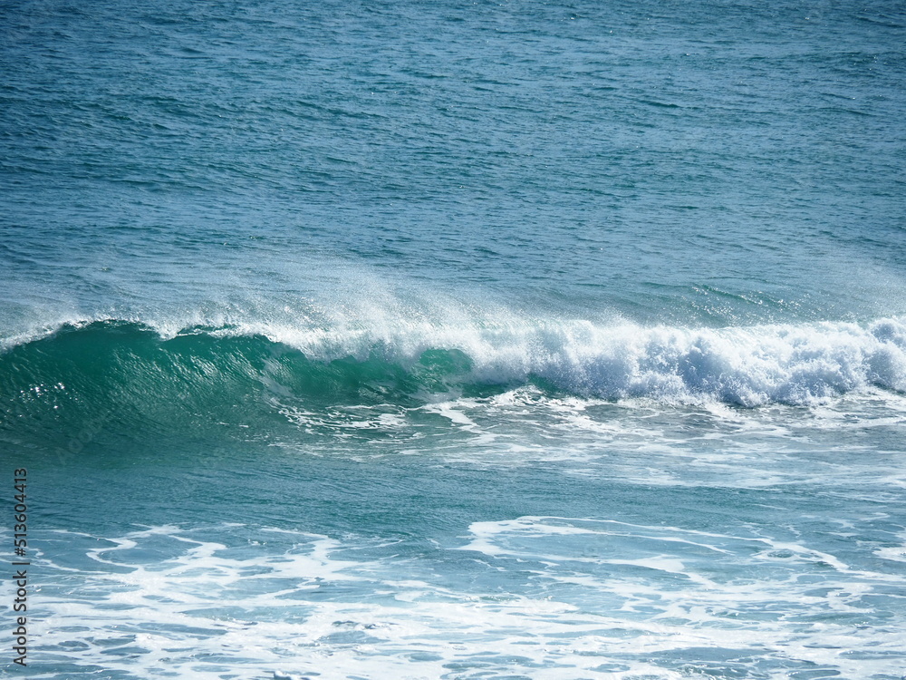 White waves crushing on blue sea White waves crushing on blue sea