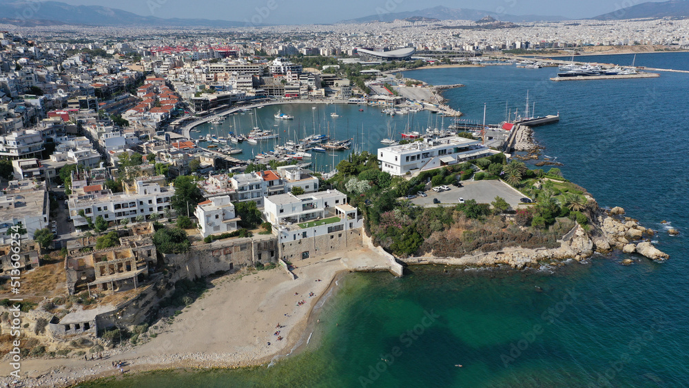 Aerial drone photo of iconic round shaped picturesque port of Mikrolimano with anchored sail boats and yachts after renovation, Piraeus, Attica, Greece