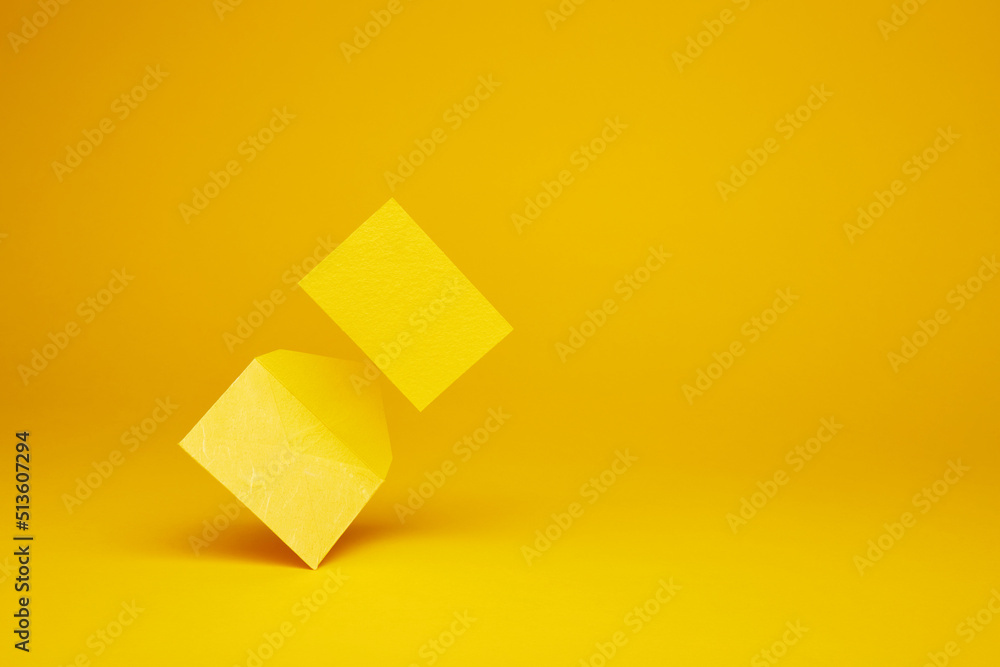 Yellow color paper office envelope with greeting, invitation or business card with copy space isolated on the bright solid fond plain yellow background Yellow color paper office envelope with greeting, invitation or business card with copy space isolated on the bright solid fond plain yellow background