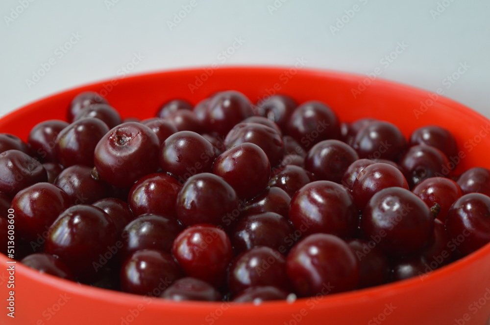 A pile of freshly picked sour cherries A pile of freshly picked sour cherries