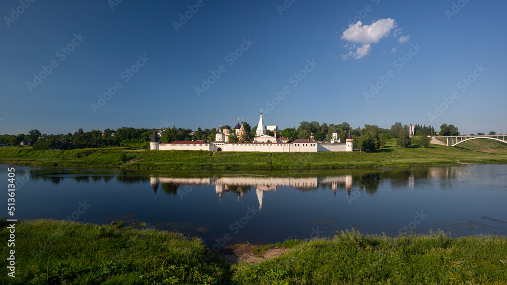 View of the Staritsky Holy Dormition Monastery on a sunny August evening. City of Staritsa. Tver region, Russia. High quality photo