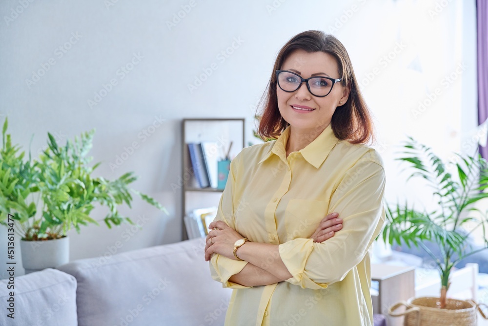Portrait of confident middle aged business woman in office Portrait of confident middle aged business woman in office