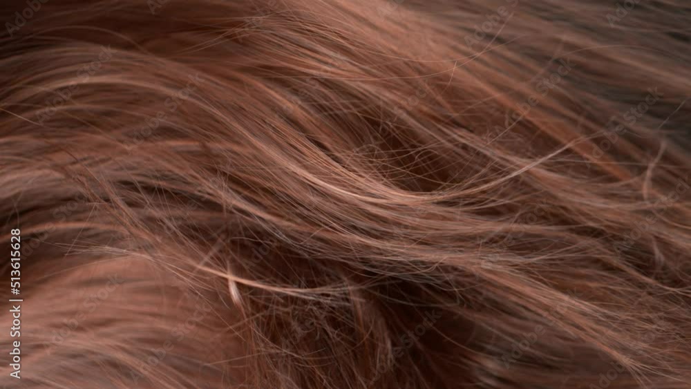 Super Slow Motion Shot of Waving Disheveled Brown Hair at 1000 fps. Super Slow Motion Shot of Waving Disheveled Brown Hair at 1000 fps.