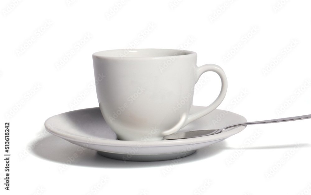 white cup on a saucer with spoon on white background white cup on a saucer with spoon on white background