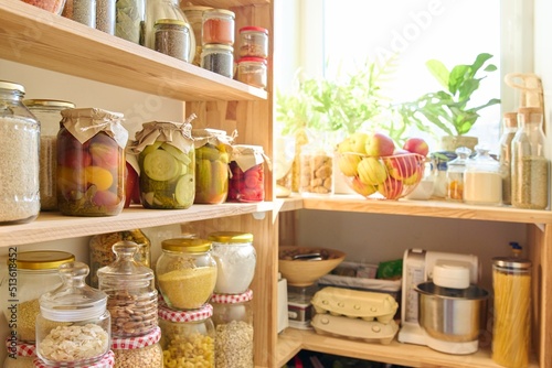 Storage of food in the kitchen in the pantry photo