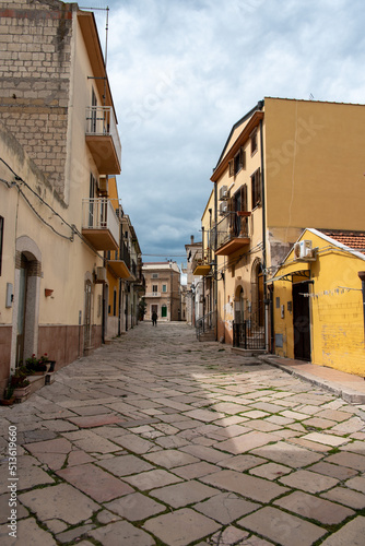 Abandoned alley and empty houses in Lesina, a small town in Gargano photo