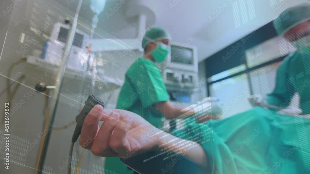Animation of data processing over caucasian surgeons during surgery Animation of data processing over caucasian surgeons during surgery