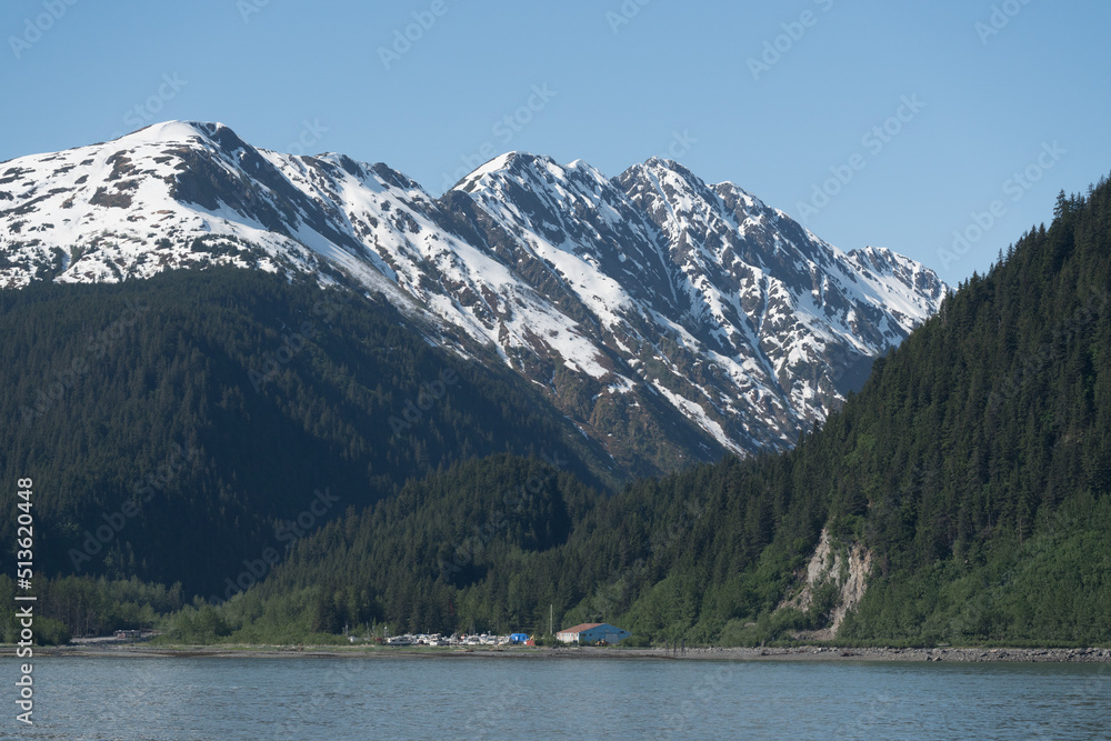 Snow covered peak of the mountain overlooking the port of Seward in Alaska Snow covered peak of the mountain overlooking the port of Seward in Alaska