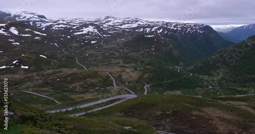 Wonderful landscapes in Norway. Innlandet. Beautiful scenery from the Sohlbergplassen lookout point on the Rondane scenic route. Mountains, Atnsjoen lake and trees 4K UHD 59,94fps ProRes 422 HQ 10 bit photo