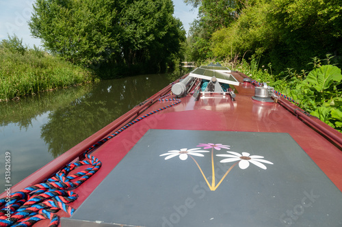 front of top of canal boat travelling up river Kennet Hampshire 